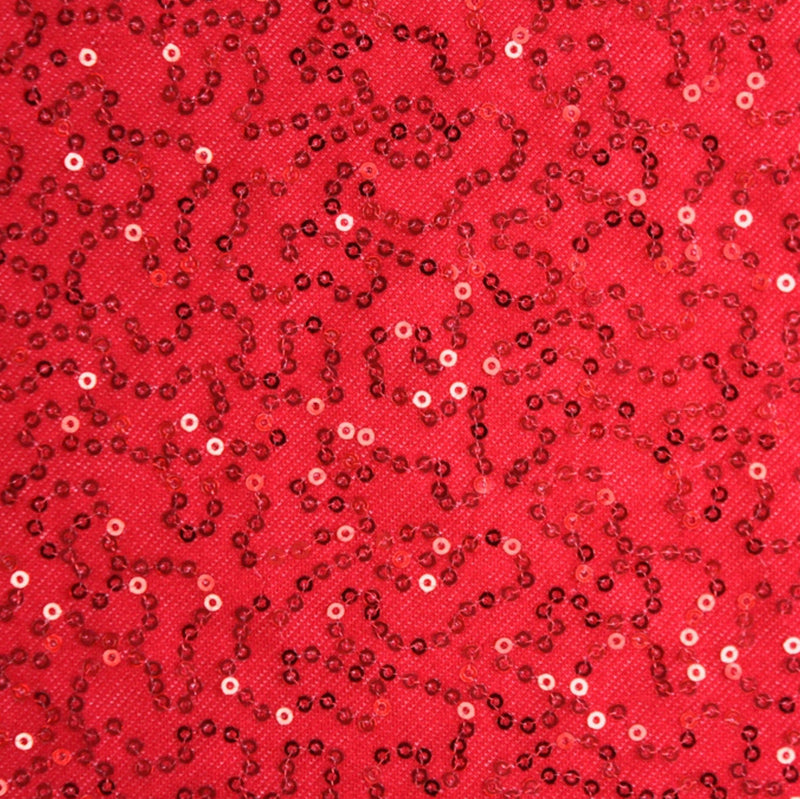 A flat sample of edgy stretch twill sequin in the color red.