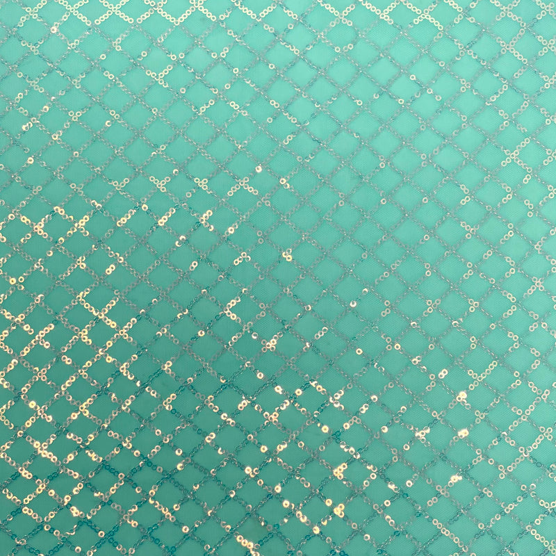 A flat sample of nina stretch mesh sequin in the color spring green/iridescent.