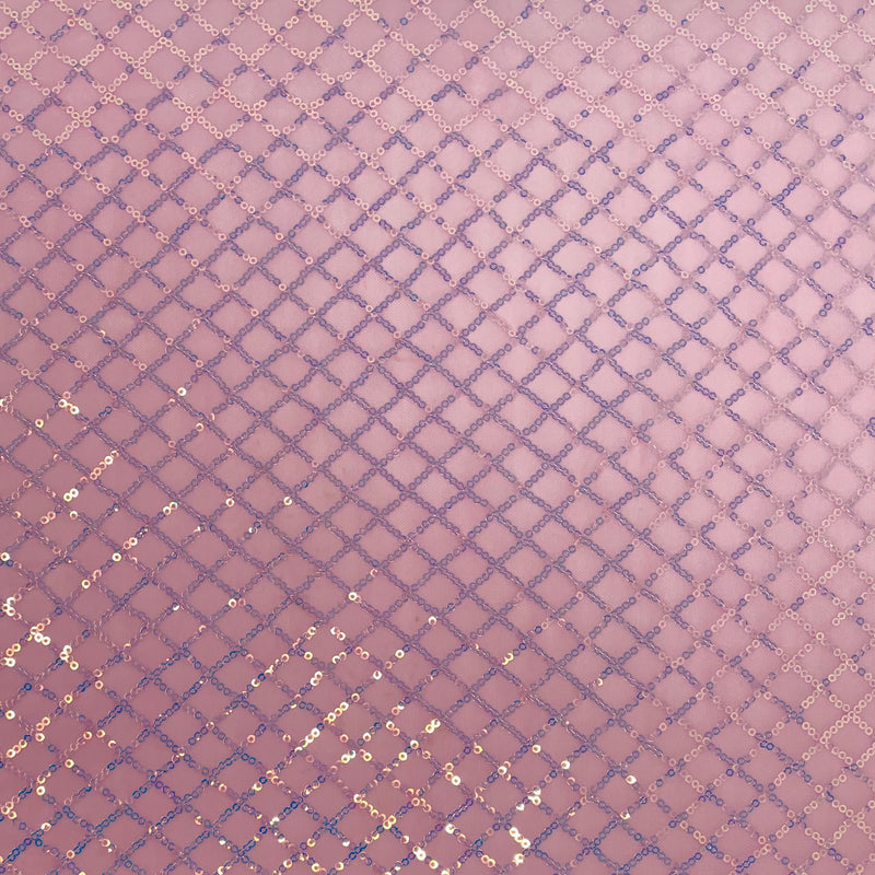 A flat sample of nina stretch mesh sequin in the color taffy/iridescent.