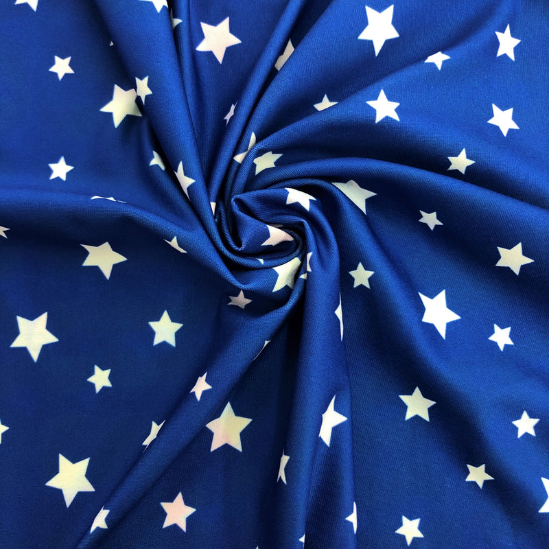 A swirled piece of double-sided tie-dye and stars polyester printed spandex.